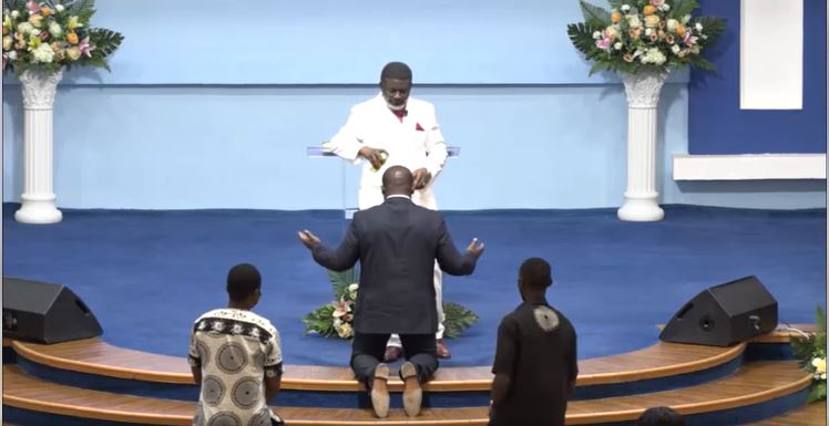 Bishop Agyinasare lays hands on Sam George