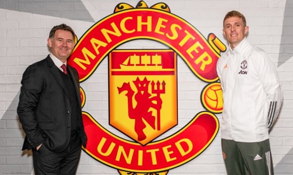 John Murtough and Darren Fletcher pose after being named Football Director and Technical Director of Manchester United. Photograph: Ash Donelon/Manchester United/Getty Images