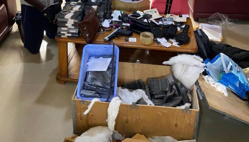 A pistol, 108 bundles of fake USD dollars were found 