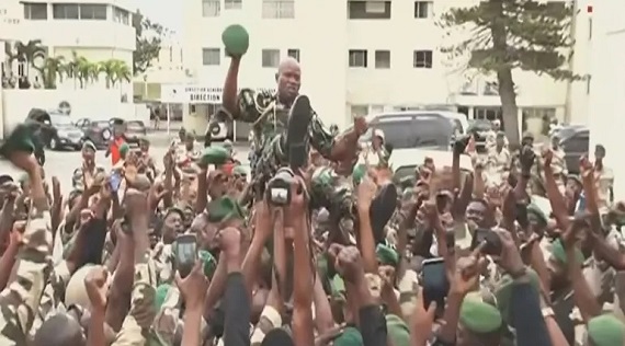 Gen Nguema was carried triumphally through the streets of the capital Libreville by his troops