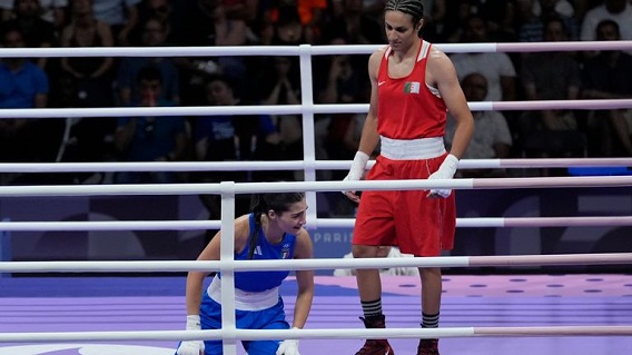 Khelif, right, and Carini after the bout. Pic: AP