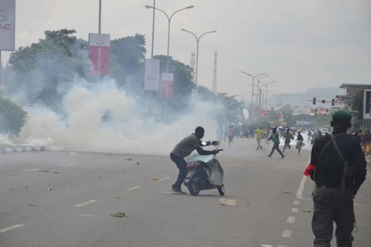 Police fired tear gas during a protest in Abuja, Nigeria, Thursday, Aug. 1, 2024. (AP Photo/Olamikan Gbemiga, File)