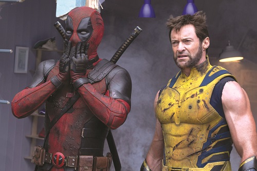 This image released by 20th Century Studios/Marvel Studios shows Ryan Reynolds as Deadpool/Wade Wilson, left, and Hugh Jackman as Wolverine/Logan in a scene from 