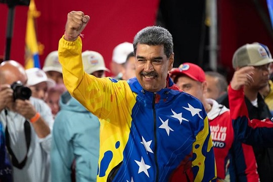 President of Venezuela Nicolas Maduro celebrates after winning the disputed presidential election (Getty Images)