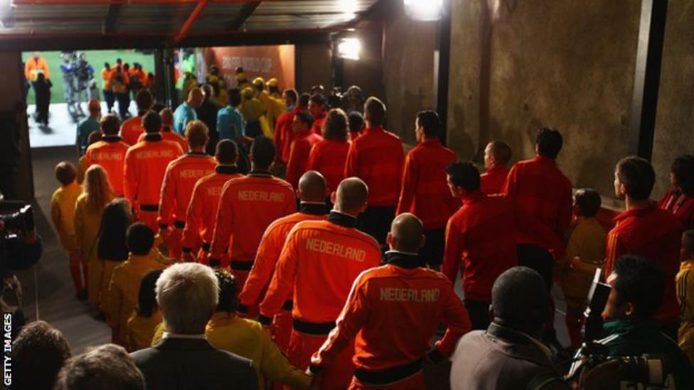 Spain and Netherlands players looking out towards football's greatest stage